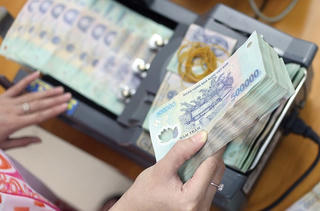 Tín dụng tăng cao nhưng không gây sức ép lên mặt bằng lãi suất