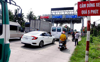 Bị phản ứng, BOT Ô Môn lại liên tục xả trạm