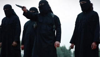 IS chặt tay bé trai, hành quyết 12 người vì không cải đạo