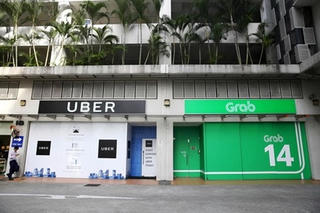 Không còn bị Uber cạnh tranh, Grab sẽ độc quyền taxi công nghệ?