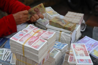 Không in thêm tiền mệnh giá nhỏ