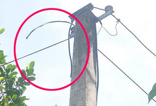 Liều lĩnh cắt đường dây điện chạy qua nhà mình