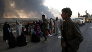 Dân trong thành Mosul tháo chạy sang Syria