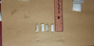 Bắt quả tang chủ tiệm cắt tóc mua bán ma túy