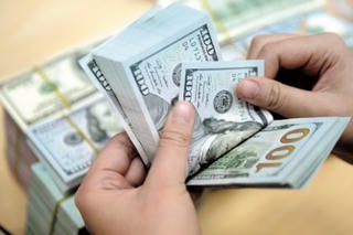 Chuyên gia lý giải việc Nga không thể từ bỏ hoàn toàn đồng USD