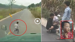 Lao sang đường, bé trai may mắn thoát chết dưới gầm container