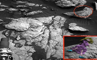 Hình khắc thiếu nữ tóc dài nằm trên tảng đá sao Hỏa