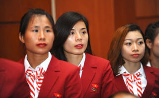 Cô gái chạy từ cánh đồng tới Olympic