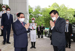 Thủ tướng Phạm Minh Chính hội kiến Tổng Bí thư, Chủ tịch nước Lào Thongloun Sisoulith