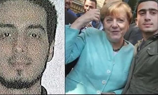 Bà Merkel chụp cùng nghi phạm khủng bố Bỉ?
