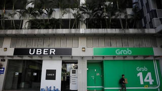 Grab và Uber bị phạt tại Singapore
