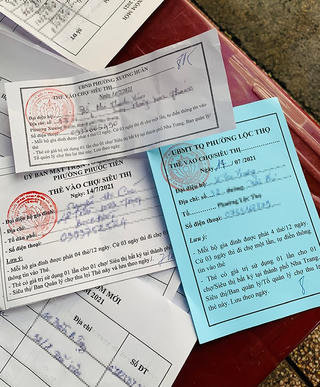 Người dân Nha Trang đi chợ bằng phiếu 