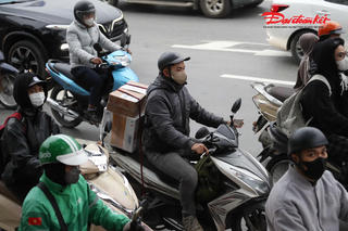 Sáng 26/1, Thủ đô Hà Nội trời rét, mưa phùn và sương mù rải rác