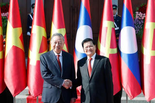 Tổng Bí thư Tô Lâm chứng kiến Lễ trao các văn kiện hợp tác Việt Nam-Lào