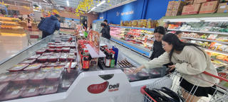 Giá cả tăng, doanh nghiệp bán lẻ nỗ lực bình ổn